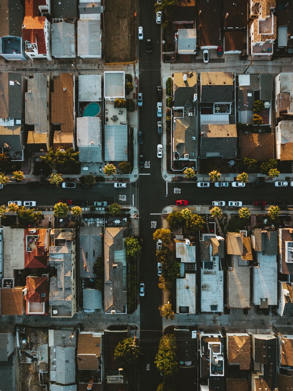 A neighborhood grid of buildings and streets as seen from above.