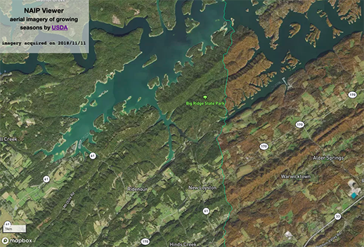 Screenshot of the NAIP viewer. The image was acquired on 2018/11/11, and displays an arial view of the Big Ridge State Park. The left side of the park is a dark green, and the right side is a dark brown.
