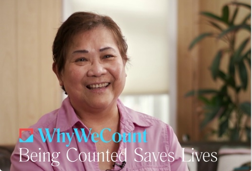 Seated, smiling woman. Below is the logo of Why We Count and text that reads Being Counted Saves Lives.
